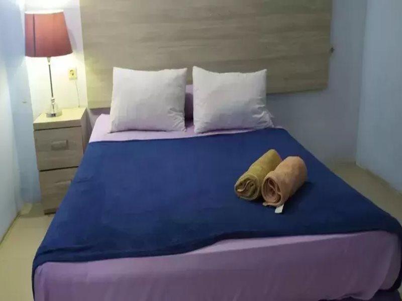 Martapura  Super Oyo 3903 Sweethome Syariah Guesthouse מראה חיצוני תמונה